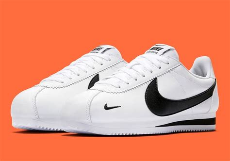 big swoosh nike schuhe|nike white shoes black swoosh.